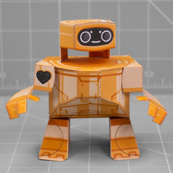 A photo of a papercraft depicting a cute orange robot with large round eyes