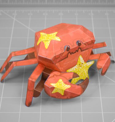 A courageous red crab with one large claw, covered in bright yellow starfish