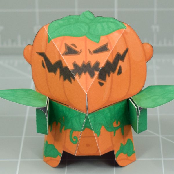 a photo of a papercraft pumpkin monster