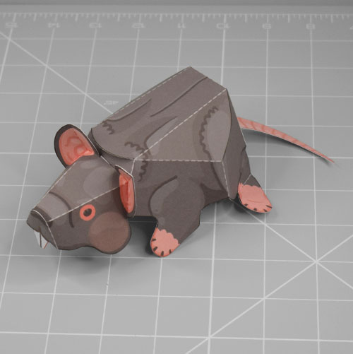 a photo of a papercraft depicting a simple and cute plague rat